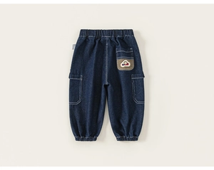 Close-up of boys' navy blue cargo jeans with elastic waist and baseball themed embroidery