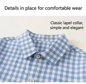 Detail of classic collar and blue checkered fabric on cotton toddler shirt