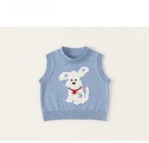 Close-up of light blue knit vest for boys featuring a white puppy pattern and ribbed edges