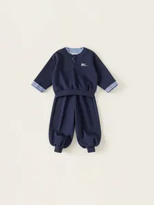Boys navy blue two-piece casual set featuring faux layered shirt collar and jogger pants