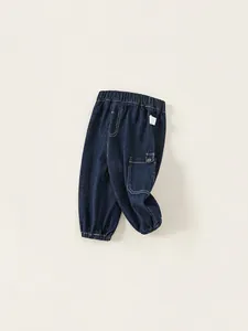 Boys deep blue denim cargo joggers with elastic waist and white contrast stitching