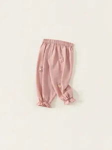 Pink toddler girls jogger pants with elastic waist and floral embroidery details