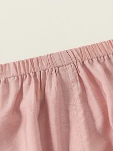 Toddler girls pink casual trousers with elastic waistband and soft cotton texture