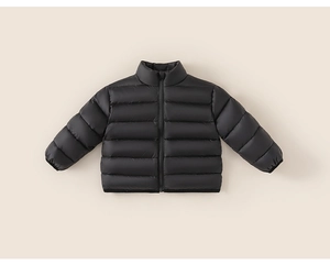 Detailed flat lay of children's black quilted down jacket with zipper and stand collar