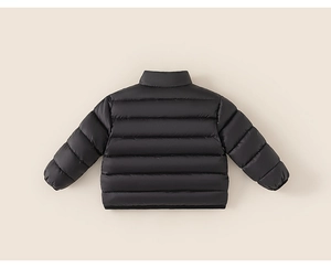 Detail view of the black quilted pattern on the back of children lightweight down jacket