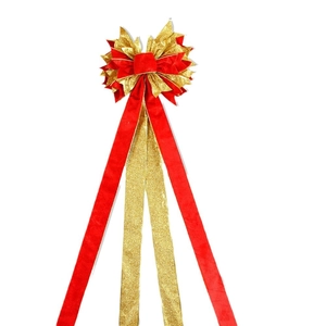 Large red velvet and gold glitter Christmas tree topper bow with long hanging ribbons
