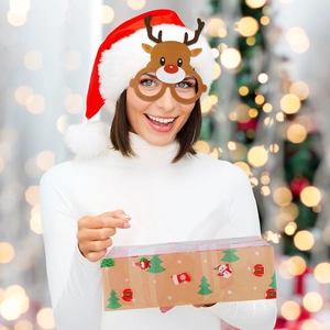 Christmas reindeer antler party glasses worn by a model in a festive holiday setting