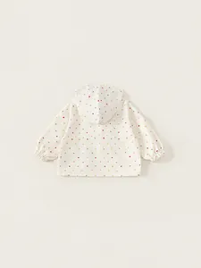 Polka dot hooded outdoor windbreaker for children featuring colorful spots and elastic cuffs