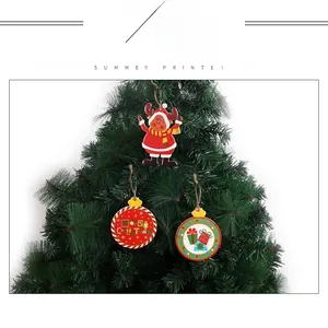 Close-up of wooden Christmas tree ornaments with reindeer design and Merry Christmas text