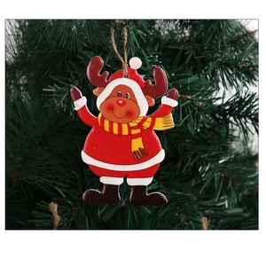 Detail of reindeer Christmas tree ornament with red festive clothes and a yellow scarf