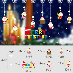 Detailed dimensions of Christmas window stickers featuring Santa Claus and snowflake motifs