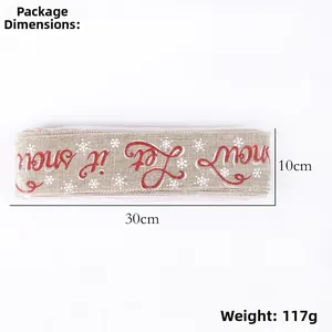 Detail of 10cm wide burlap Christmas ribbon with Let It Snow text and snowflake patterns