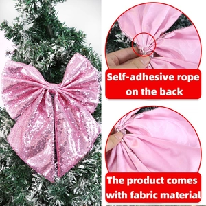 Fiocco rosa di paillettes per albero di Natale con dettaglio cordino autoadesivo