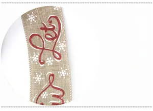 Detail of 10m burlap Christmas ribbon with white snowflakes and red glitter lettering