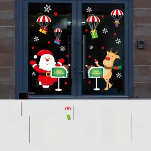 Detailed size guide for Christmas static window stickers with Santa and reindeer motifs