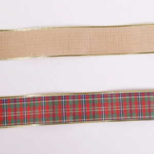 Detail of beige gold metallic mesh ribbon and classic red plaid holiday gift ribbon