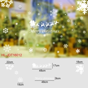 Detailed size specifications for Christmas window stickers with Santa and snowflake motifs