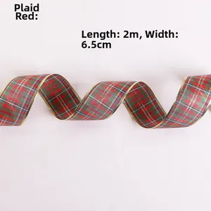 Detail view of red plaid Christmas ribbon with gold edges measuring 2 meters by 6.5 cm