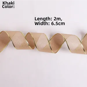 Close-up of khaki Christmas ribbon with gold wired edges, 2m long and 6.5cm wide