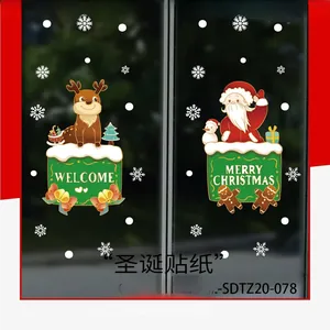 Detail of Christmas window stickers featuring Santa, reindeer and Merry Christmas text