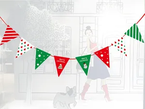 Detailed view of Merry Christmas paper bunting flags in festive red, green, and white