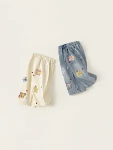 Pantalones informales para niñas con diseño de patchwork floral colorido en beige y azul denim