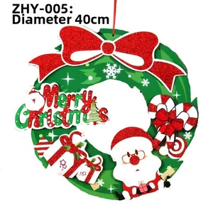 Detail of a 40cm Christmas paper wreath with Santa Claus, snowmen and candy cane decor