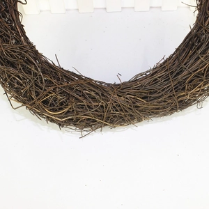 Close-up of a natural dried rattan wreath base for DIY Christmas crafts and rustic decor
