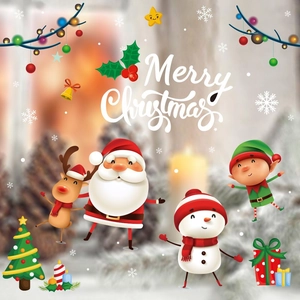 Close-up of colorful Christmas window stickers with Santa Claus, elk, and snowman motifs