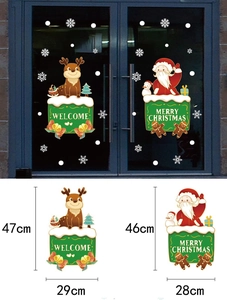 Detailed view of Christmas static stickers with Santa and Reindeer designs for window decor