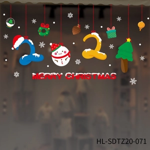 Close-up of Christmas 2021 window clings with snowmen and Merry Christmas lettering
