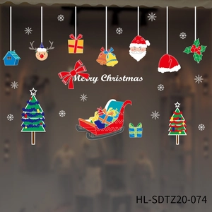Detailed view of Christmas window decals featuring Santa, reindeer and tree ornaments