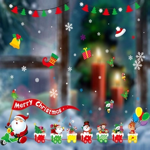 Detailed view of Christmas window stickers featuring Santa Claus on a scooter and festive train