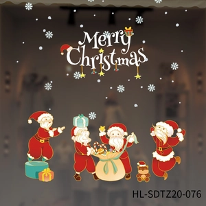 Detail view of Merry Christmas window decals with Santa Claus and snowflakes motifs