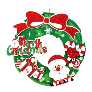 Christmas paper wreath with Merry Christmas sign, Santa Claus, and candy cane ornaments