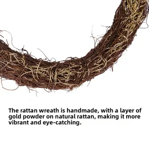 Close-up of handmade brown rattan wreath with sparkling gold glitter finish and natural texture