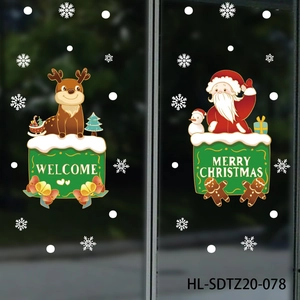 Detail of Christmas window stickers featuring reindeer, Santa Claus, and snowflakes decals