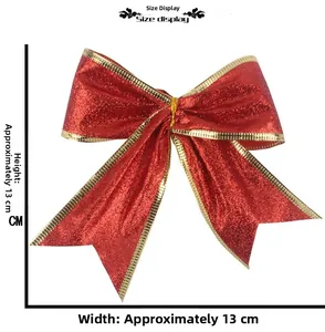 Detailed view of 13cm red glitter Christmas bow with gold trim on white background