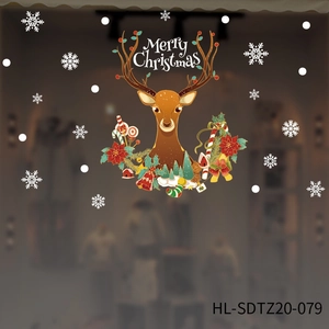 Macro detail of Merry Christmas reindeer window sticker with festive decorative elements