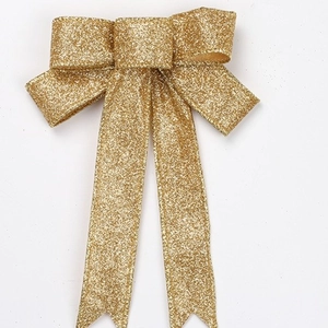 Sparkling gold glitter Christmas ribbon bow for holiday gift boxes and festive decoration