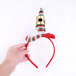 Detail of Christmas headband with sequined Santa hat and white faux fur trim