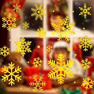 Detailed view of assorted gold snowflake window stickers for Christmas home decoration