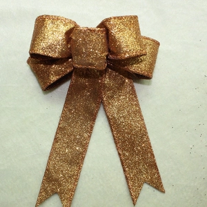 Glittery bronze Halloween bow with sequins for party decor and gift wrapping detail