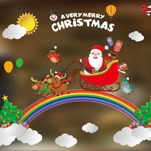Christmas static door stickers featuring Santa on a rainbow sleigh with reindeer and trees