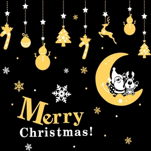 Detail of gold and white static Christmas window stickers with Santa and reindeer motifs