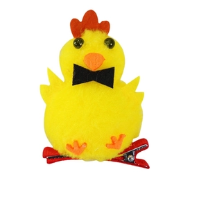 Easter plush yellow chick hair clip with red bow and metal duckbill grip on white background