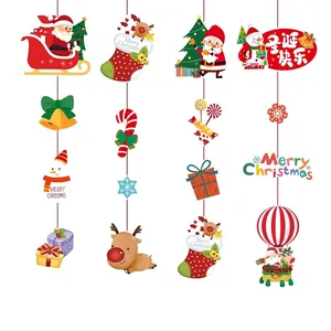 Vue détaillée de 12 pendentifs de Noël en carton avec des tailles de 16 à 20 cm environ