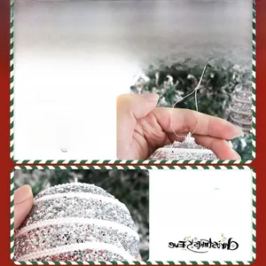 Close-up of sparkling silver sequins and gold glitter on Christmas ball with silver hanging rope
