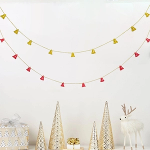 Close-up of 2m gold and red Christmas bell garland hanging with festive holiday decorations