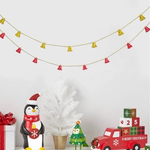 Detail of 2m red and gold Christmas bells garland hanging on a wall for party decor